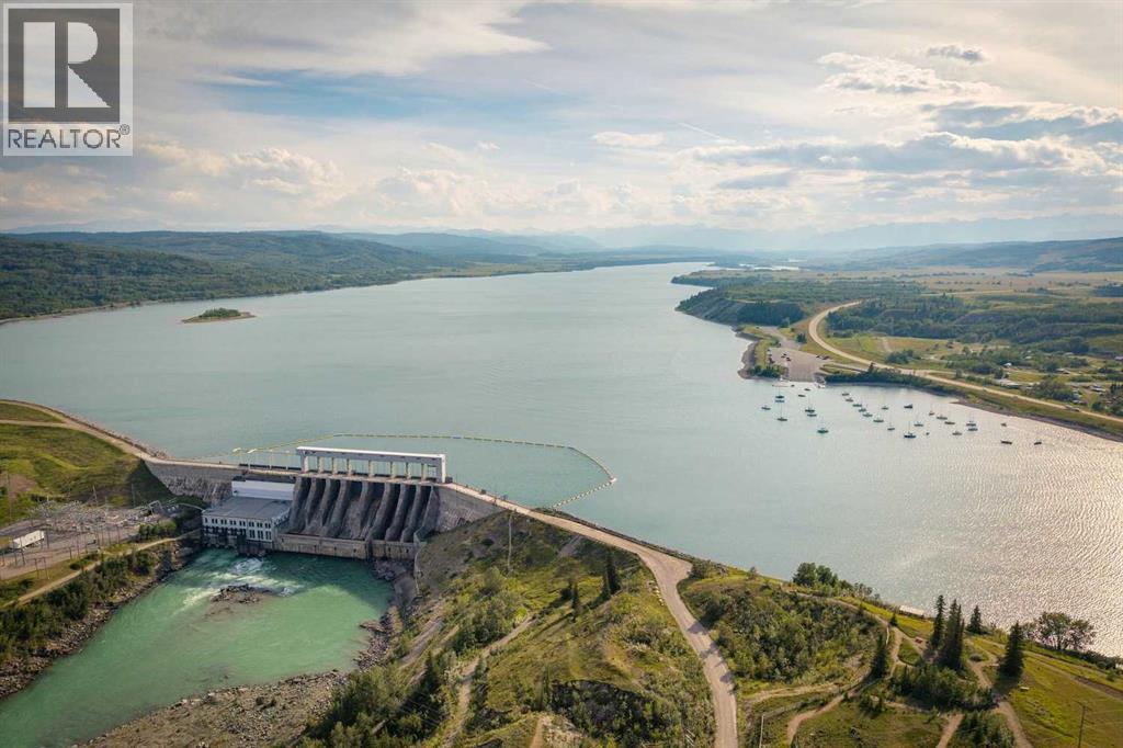 606 Cottageclub Bend, Rural Rocky View County, Alberta  T4C 1B1 - Photo 4 - A2261043