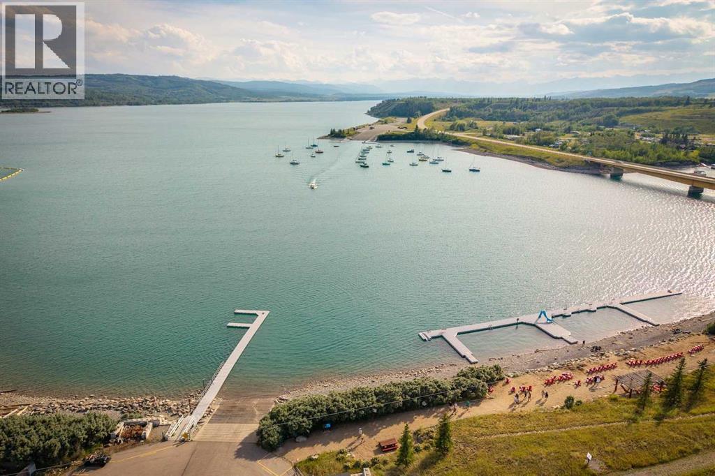 606 Cottageclub Bend, Rural Rocky View County, Alberta  T4C 1B1 - Photo 5 - A2261043