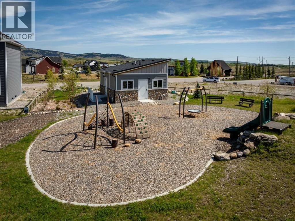 606 Cottageclub Bend, Rural Rocky View County, Alberta  T4C 1B1 - Photo 6 - A2261043