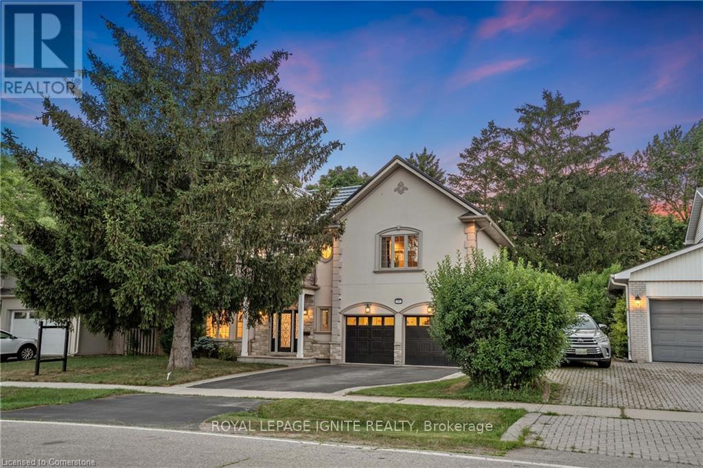 31 Ridge Drive, Oakville, Ontario  L6H 1B7 - Photo 2 - W12434789