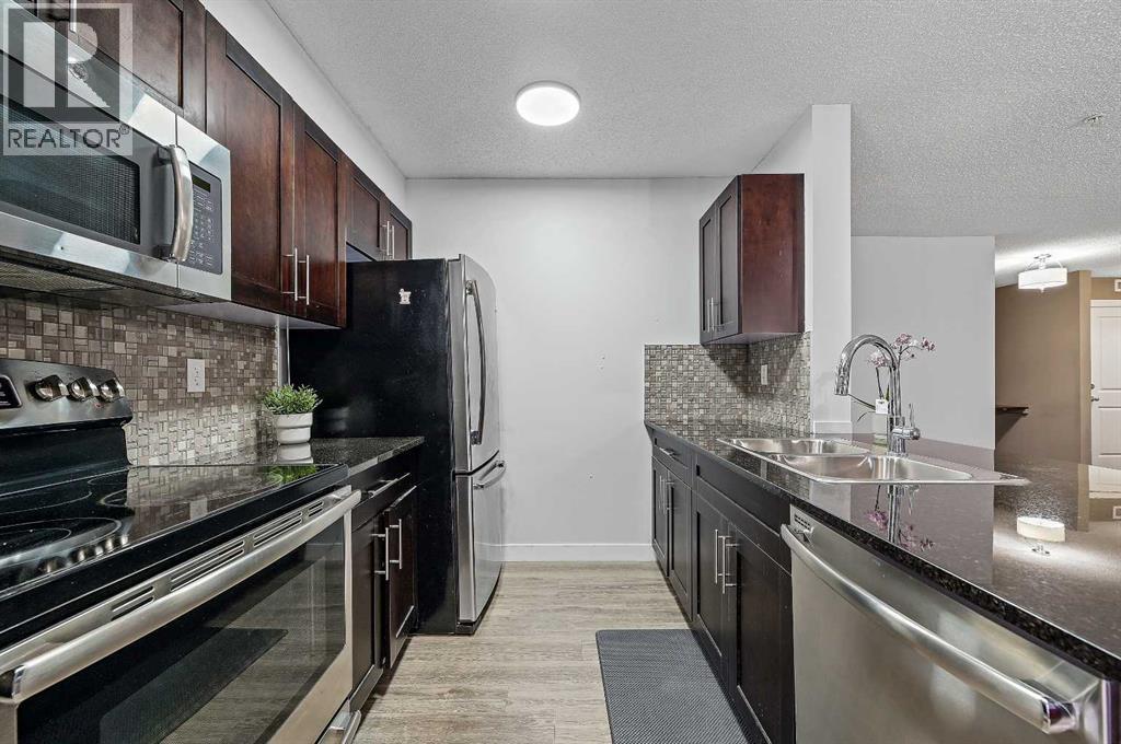 8113, 403 Mackenzie Way Sw, Airdrie, Alberta  T4B 3V7 - Photo 11 - A2242399