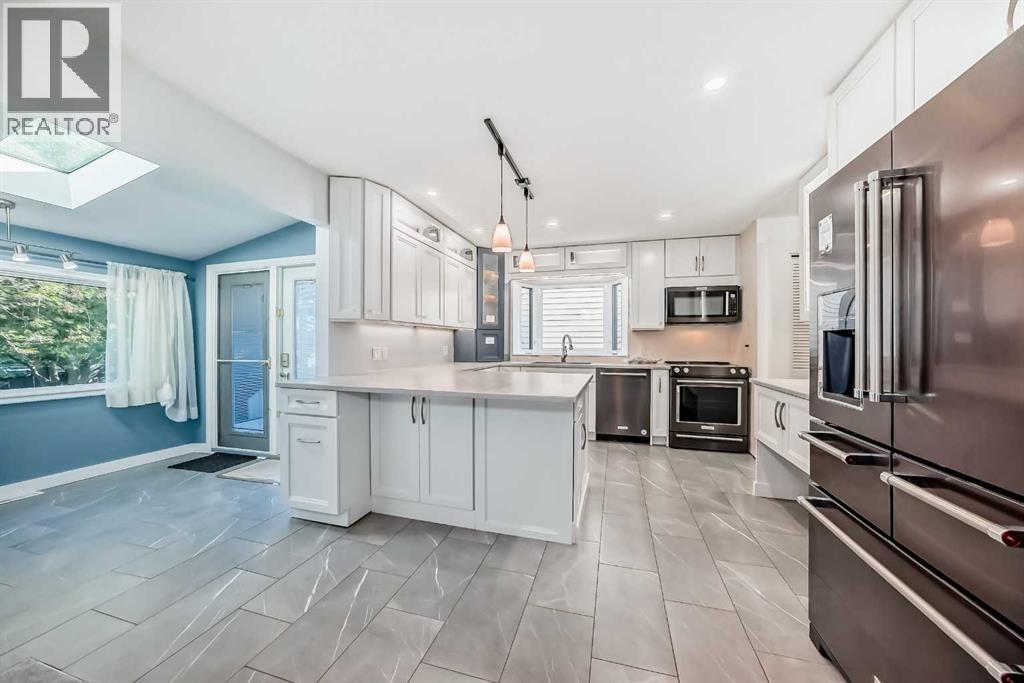 6628 Ranchview Drive Nw, Calgary, Alberta  T1Y 1T1 - Photo 5 - A2253235