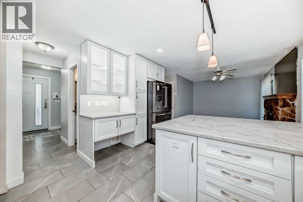 6628 Ranchview Drive Nw, Calgary, Alberta  T1Y 1T1 - Photo 7 - A2253235