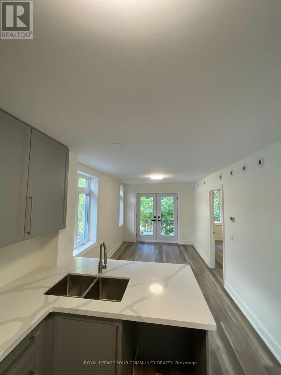 8 - 263 Barrie Street W, Bradford West Gwillimbury, Ontario  L3Z 1A2 - Photo 7 - N12428322