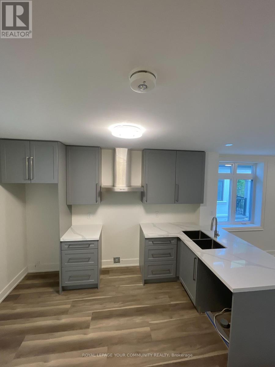 8 - 263 Barrie Street W, Bradford West Gwillimbury, Ontario  L3Z 1A2 - Photo 5 - N12428322