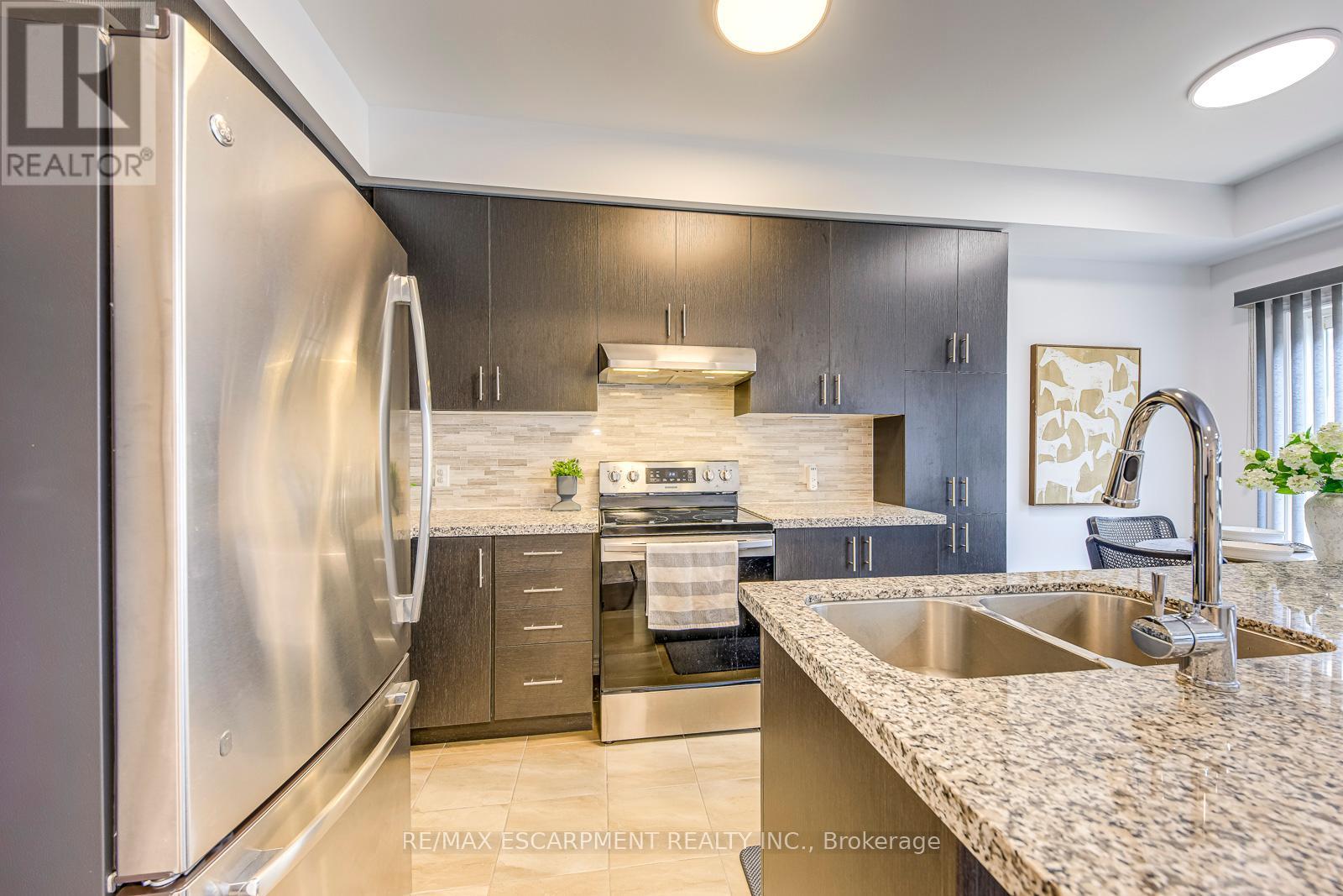414 Wheat Boom Drive, Oakville, Ontario  L6H 0R4 - Photo 11 - W12435001