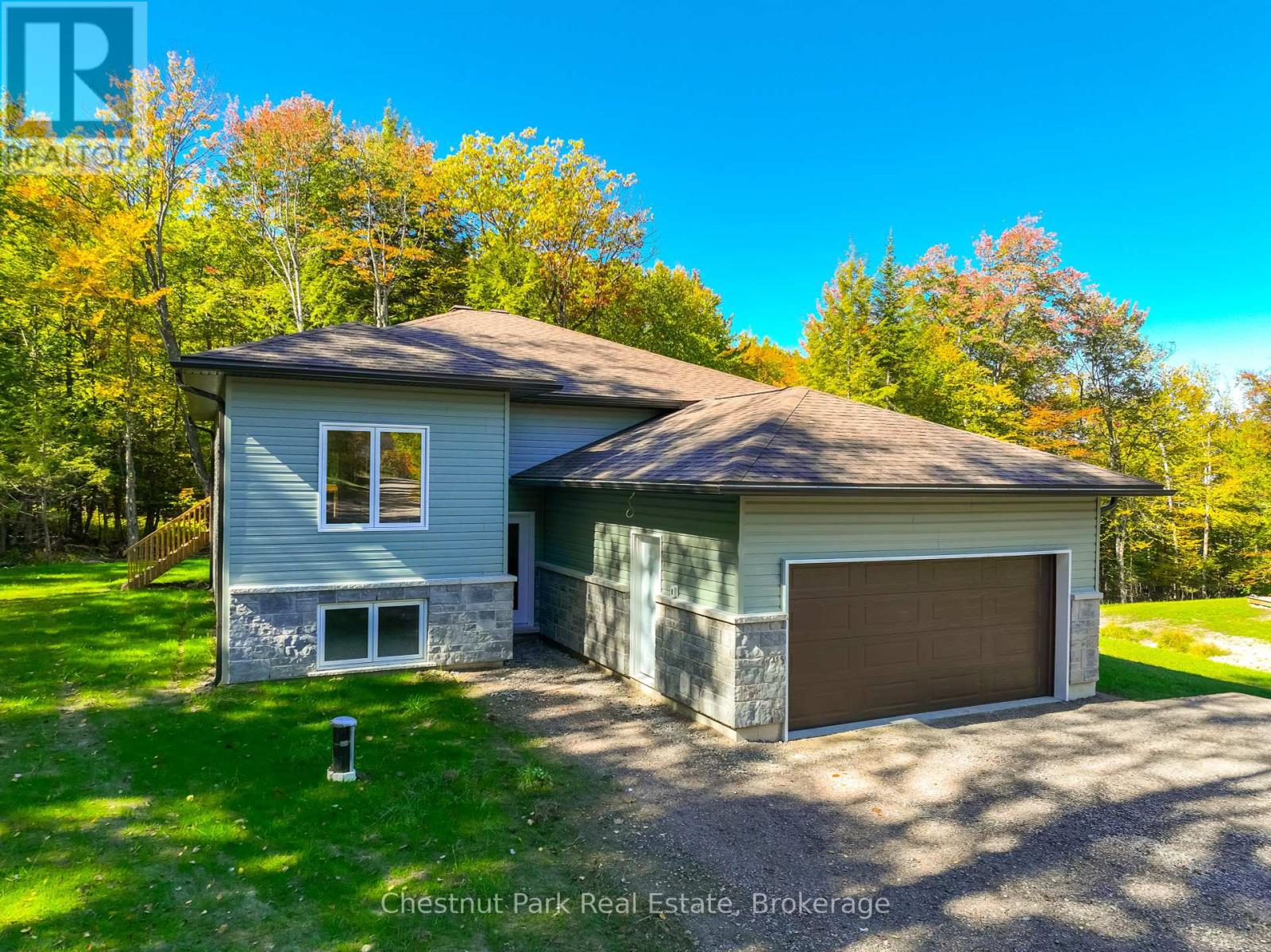 26 Aspen Lane, Nipissing, Ontario  P0H 1Z0 - Photo 1 - X12435223