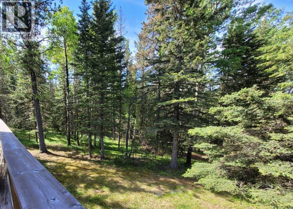 64 Breezewood Bay, Bragg Creek, Alberta  T0L 0K0 - Photo 7 - A2190075