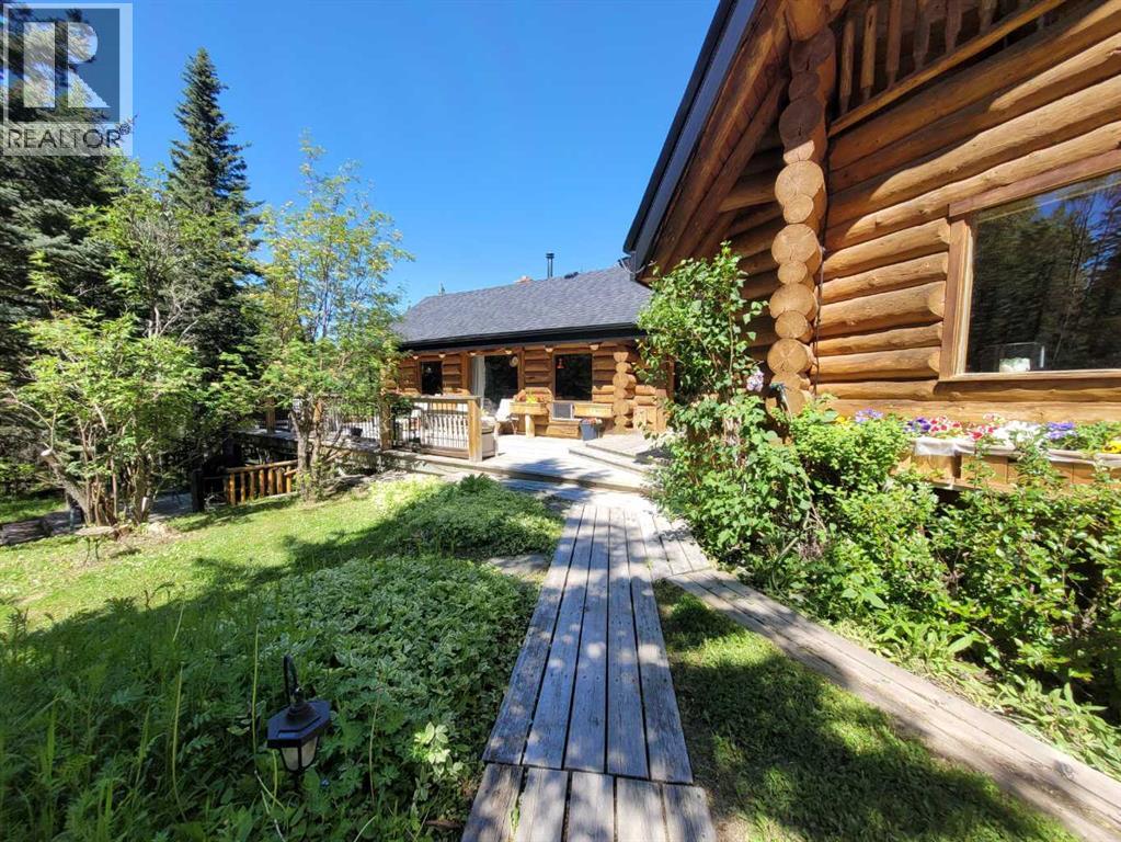 64 Breezewood Bay, Bragg Creek, Alberta  T0L 0K0 - Photo 2 - A2190075