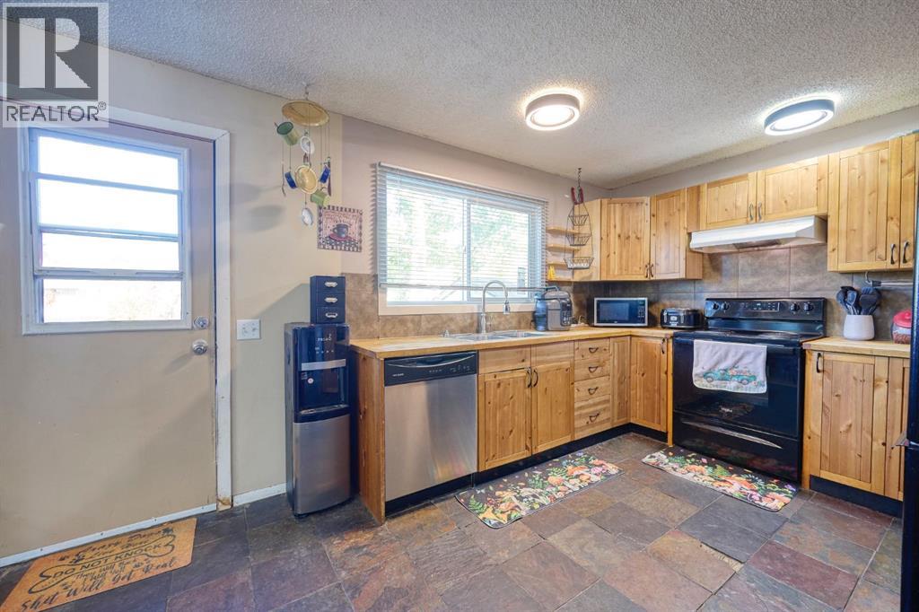 24 Hunters Gate, Okotoks, Alberta  T1S 1K9 - Photo 8 - A2260468