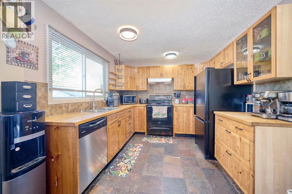 24 Hunters Gate, Okotoks, Alberta  T1S 1K9 - Photo 6 - A2260468