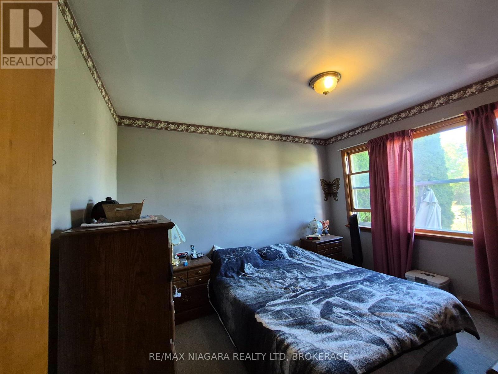 5711 Kitchener Street, Niagara Falls (Hospital), Ontario  L2G 1B9 - Photo 4 - X12435509