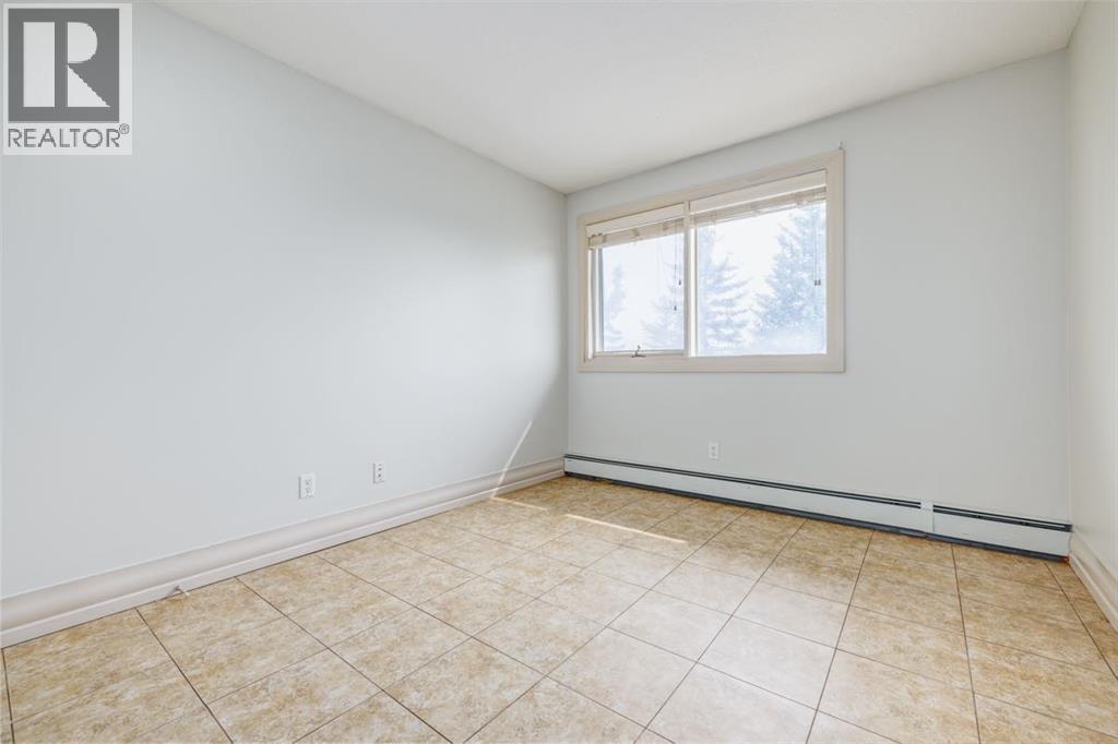 7, 304 Village Mews Sw, Calgary, Alberta  T3H 2L3 - Photo 12 - A2230989
