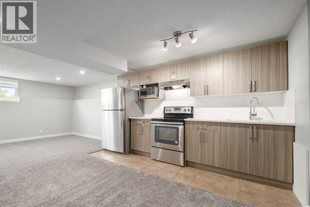 11036 7 Street Sw, Calgary, Alberta  T2W 0G7 - Photo 30 - A2242239
