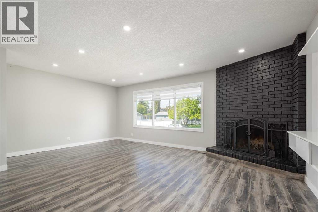 11036 7 Street Sw, Calgary, Alberta  T2W 0G7 - Photo 7 - A2242239
