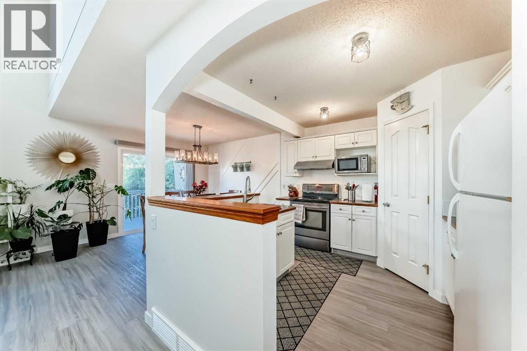 202 Bridlewood Court Sw, Calgary, Alberta  T2Y 3Z2 - Photo 9 - A2258646