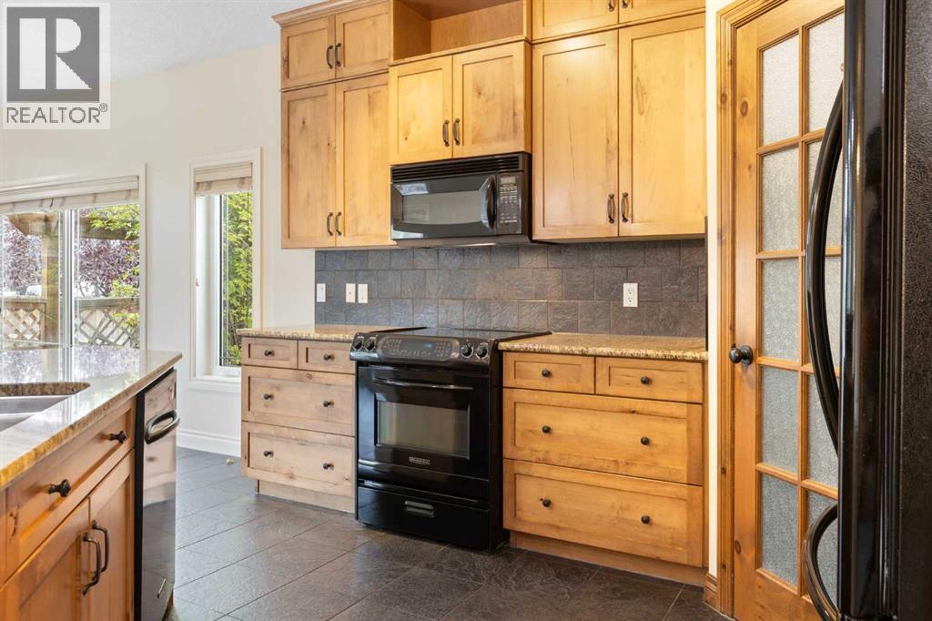 119 Auburn Bay Close Se, Calgary, Alberta  T3M 0E9 - Photo 4 - A2257814