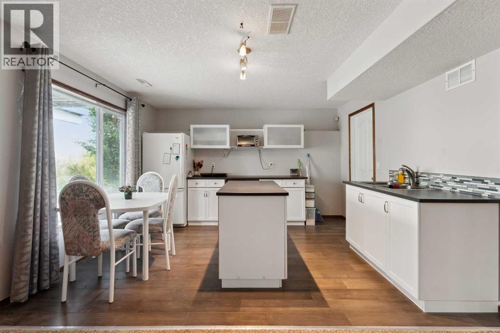 16 Bow Ridge Drive, Cochrane, Alberta  T4C 1V6 - Photo 35 - A2230277