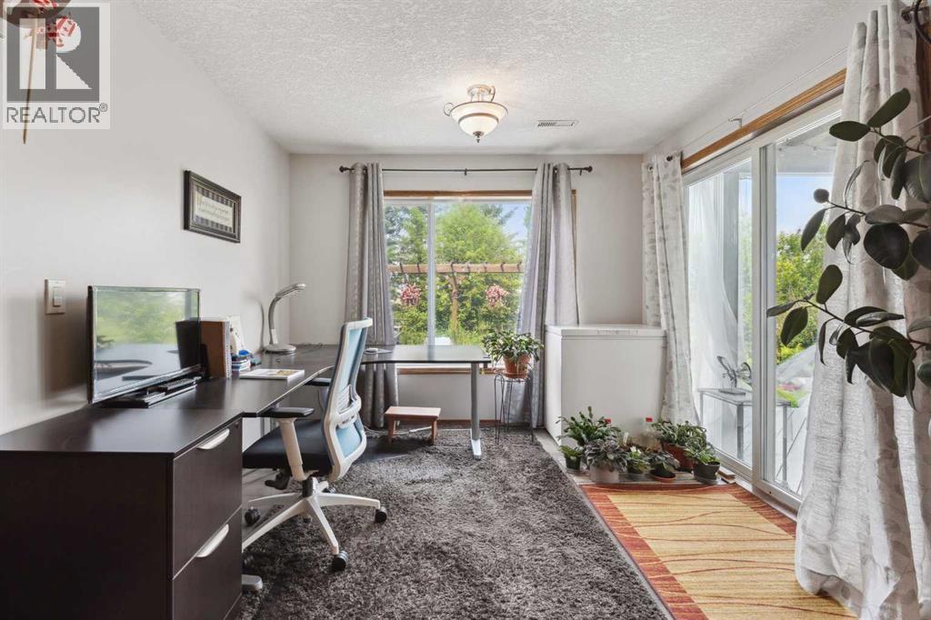 16 Bow Ridge Drive, Cochrane, Alberta  T4C 1V6 - Photo 36 - A2230277