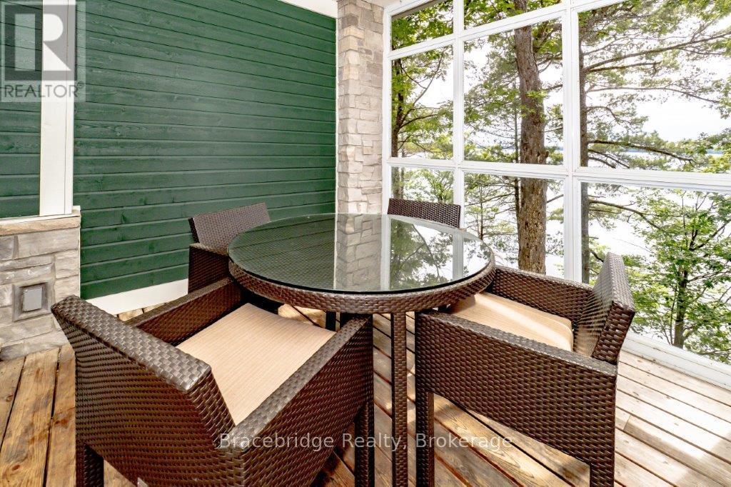 A102-C2 - 1869 Muskoka 118 Road W, Muskoka Lakes, Ontario  P1L 1W8 - Photo 2 - X12436077