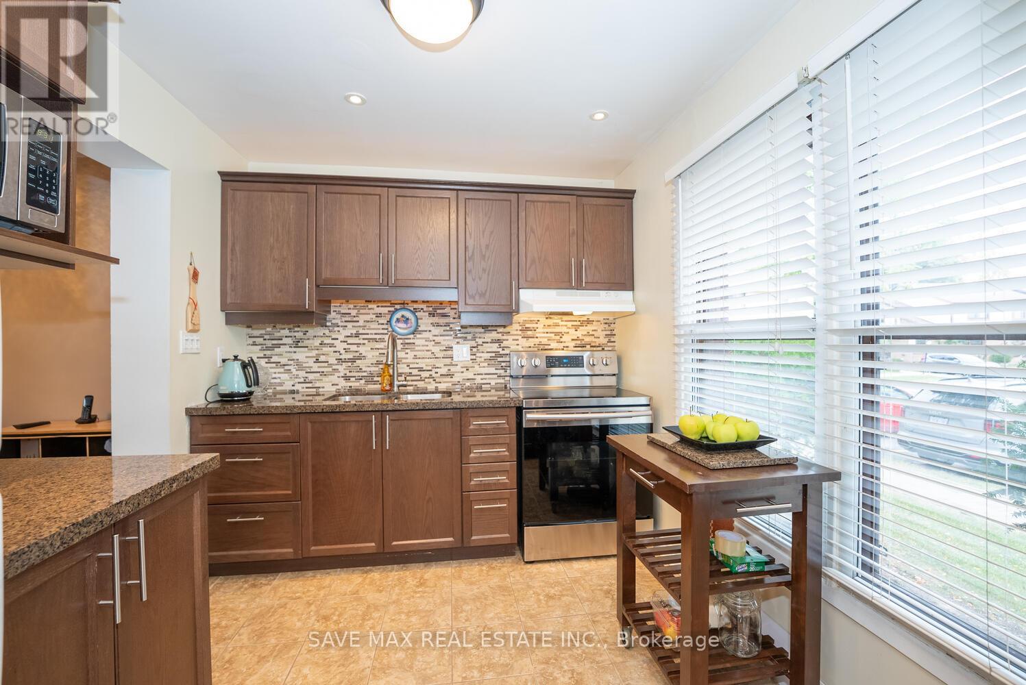 31 - 6650 Falconer Drive, Mississauga, Ontario  L5N 1B5 - Photo 4 - W12436098