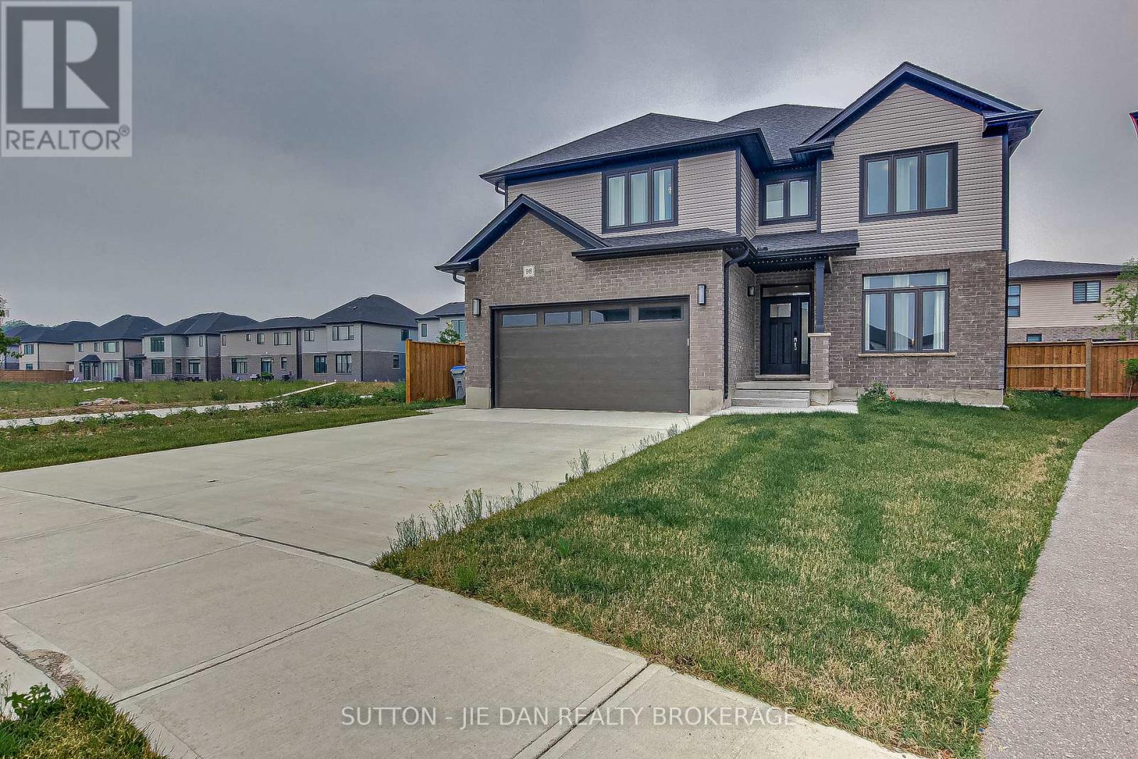 Only 4 years old! 2656 SqFt plus 1152 SqFt fully finished basement! This beautiful home located on a quiet crescent features a concrete front porch, concrete driveway and a concrete path to the backyard along the left side of the house. Enter through a welcoming foyer next to a spacious dining room before entering a designer kitchen with a butlers pantry. A huge living room with a cozy fireplace opens up from the kitchen. The second floor includes four bedrooms as well as a family/media room. A luxury ensuite and spacious his and hers walk-in-closets compliment the primary bedroom. The other three bedrooms boast their own walk-in-closets. The second floor bathroom consists of two sinks and plenty of space. The main floor has a spacious laundry room. Separate entrance to the fully finished basement with two bedrooms, recreation room, and bathroom. Kilworth Heights West is the perfect union of urban and rural living. A fitness facility, a community centre for outdoor team sports, scenery trails in Komoka Provincial Park and along Thames River, grocery store, LCBO, and various retail stores are only 3-4 minutes away. Quick access to Highway 402. Call now for your showing (id:48254)