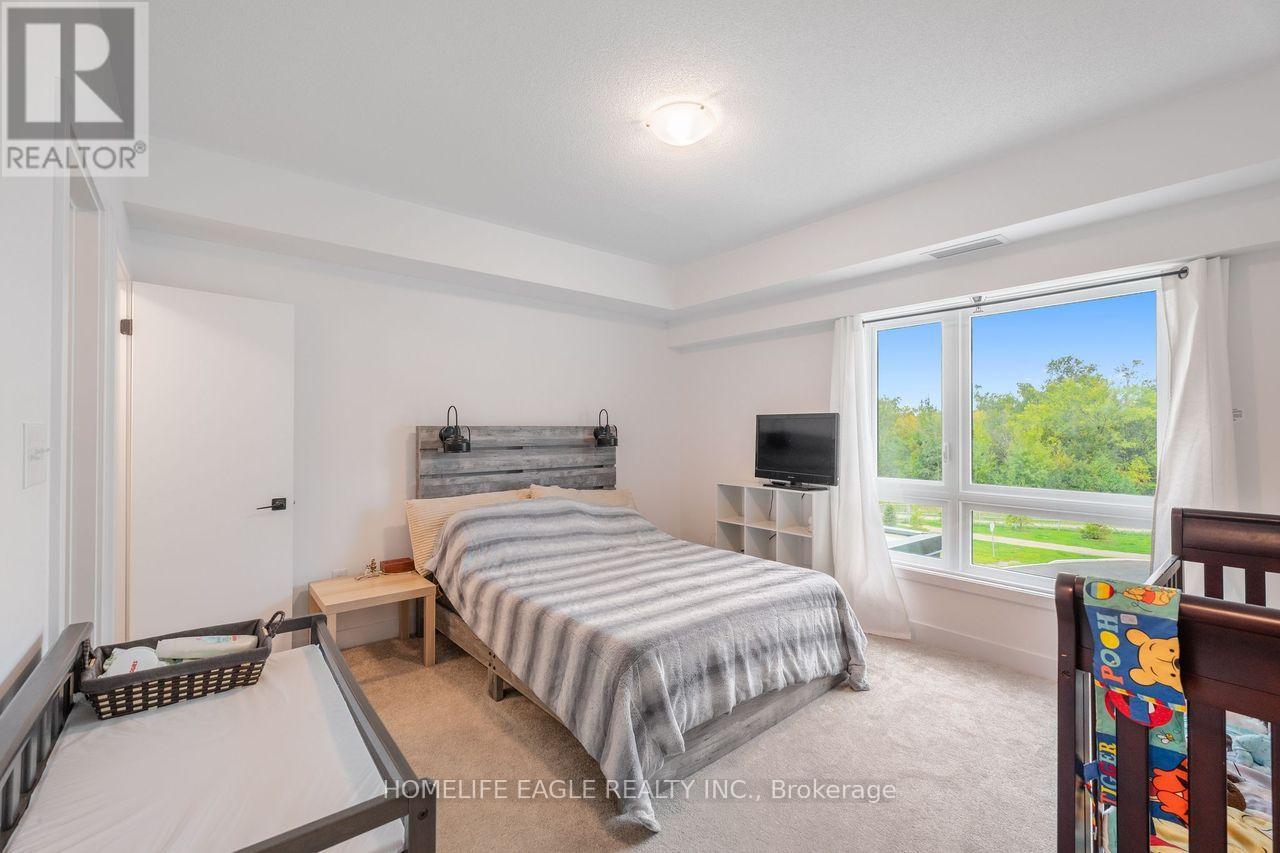 201 - 1 Chef Lane, Barrie, Ontario  L9J 0T1 - Photo 6 - S12417224