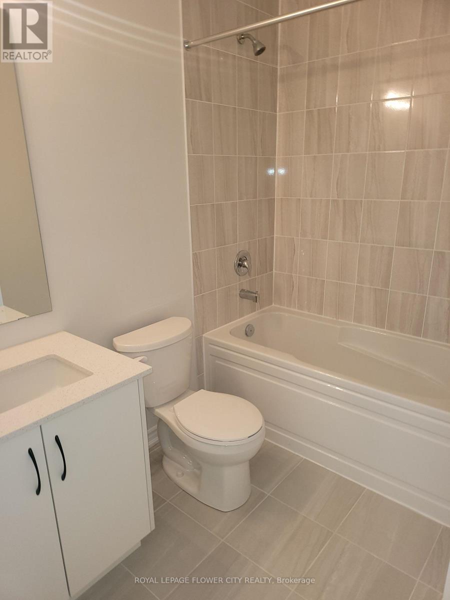 7 - 20 Knotsberry Circle, Brampton, Ontario  L6Y 0C3 - Photo 5 - W12436274