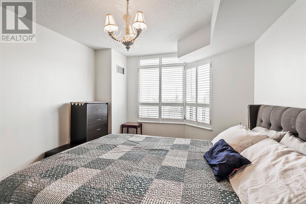 408 - 35 Kingsbridge Garden Circle, Mississauga, Ontario  L5R 3Z5 - Photo 19 - W12436655