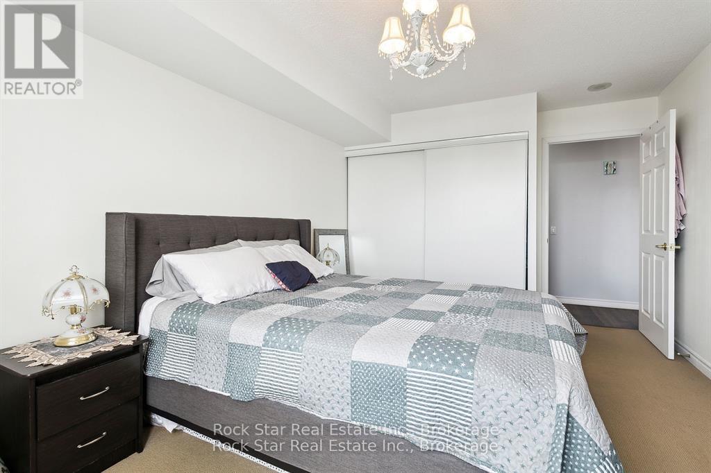 408 - 35 Kingsbridge Garden Circle, Mississauga, Ontario  L5R 3Z5 - Photo 20 - W12436655
