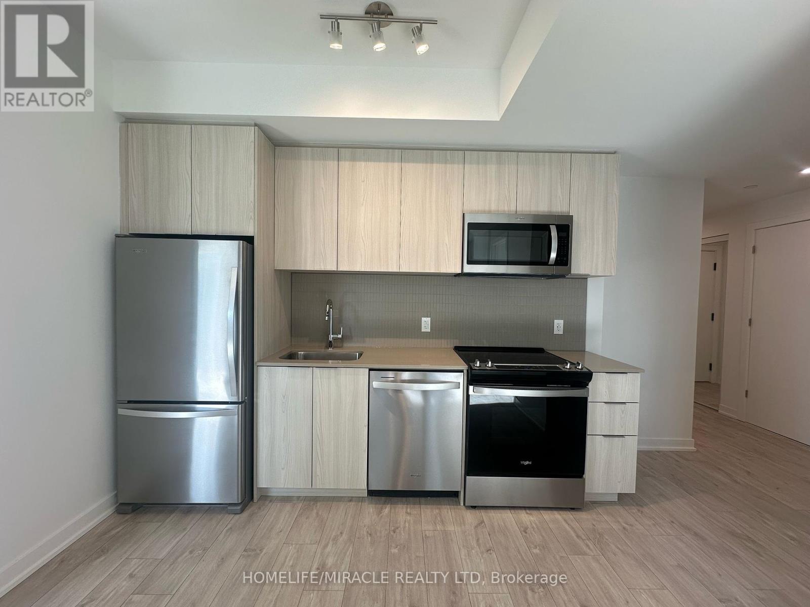 A215 - 770 Whitlock Avenue, Milton, Ontario  L9E 1S9 - Photo 5 - W12436442