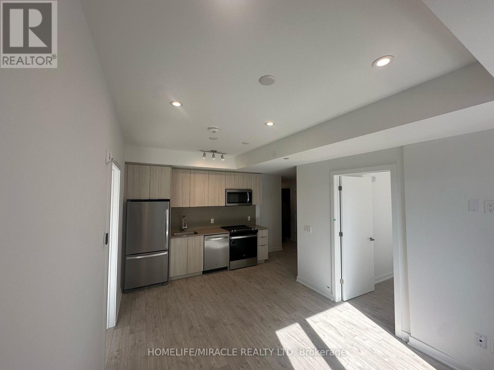 A215 - 770 Whitlock Avenue, Milton, Ontario  L9E 1S9 - Photo 7 - W12436442