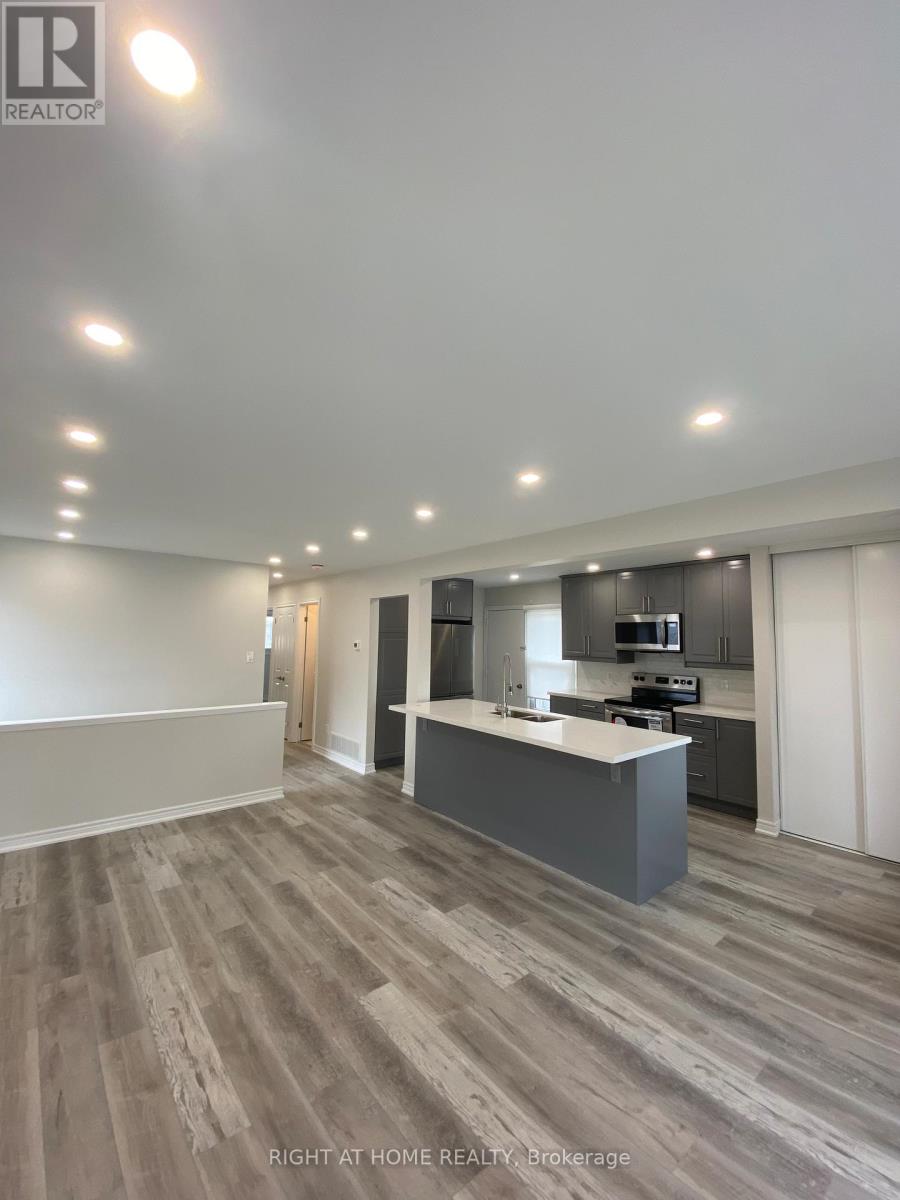 118 Avening Drive, Toronto, Ontario  M9V 4E6 - Photo 6 - W12436605