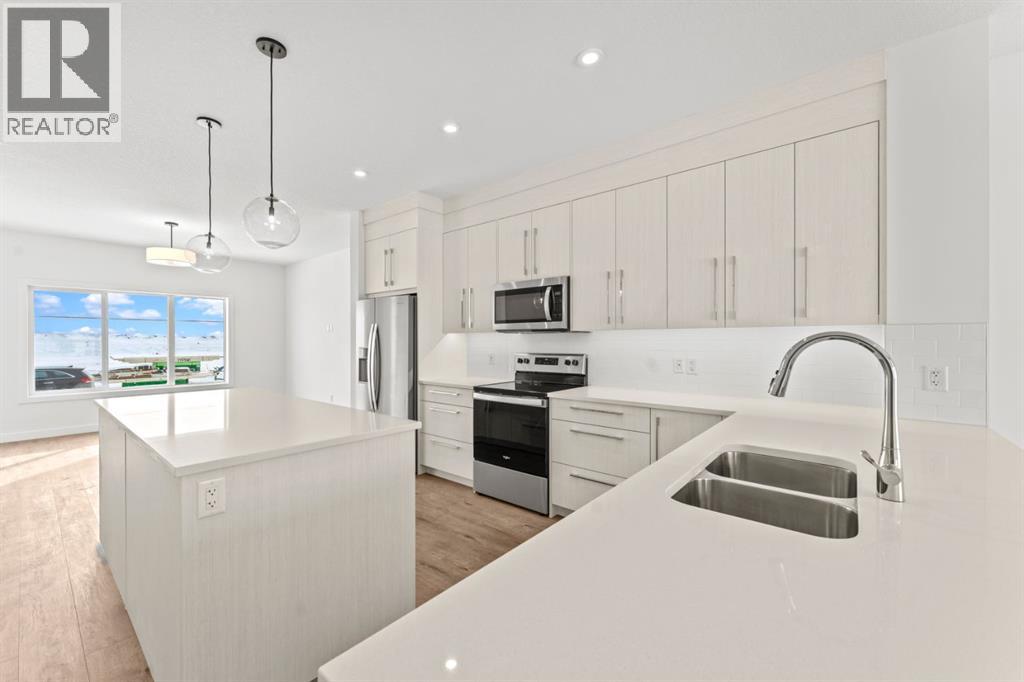 99 Raven Point Se, Calgary, Alberta  T3S 0E8 - Photo 2 - A2232542