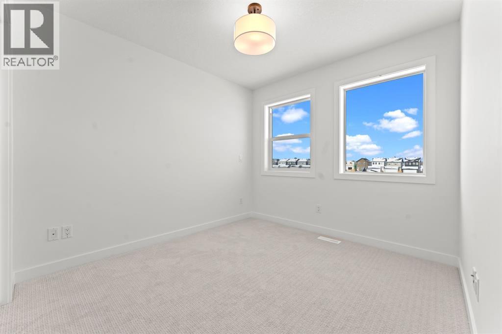99 Raven Point Se, Calgary, Alberta  T3S 0E8 - Photo 9 - A2232542