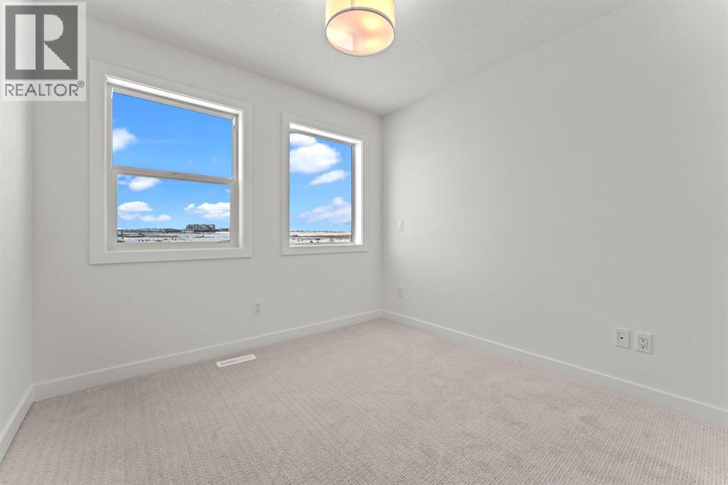 99 Raven Point Se, Calgary, Alberta  T3S 0E8 - Photo 10 - A2232542