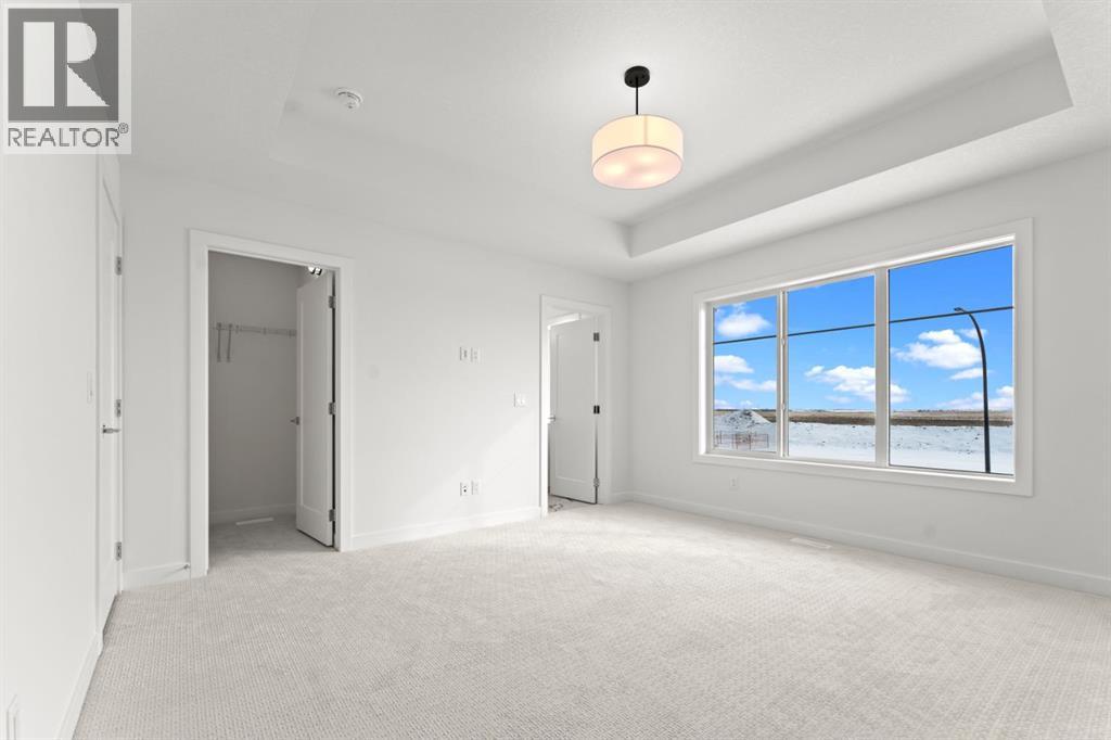 99 Raven Point Se, Calgary, Alberta  T3S 0E8 - Photo 7 - A2232542
