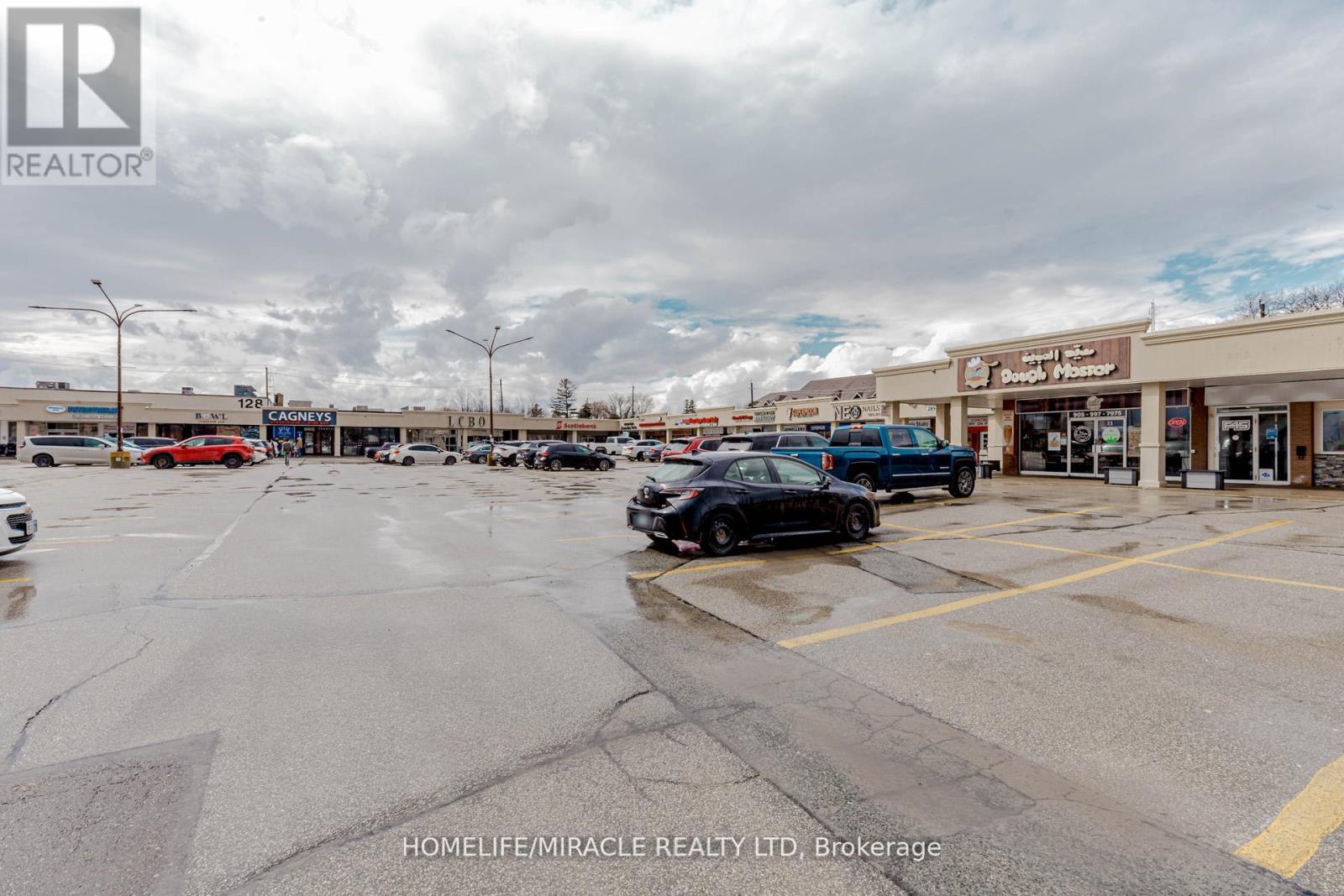 23 - 128 Queen Street S, Mississauga, Ontario  L5M 1K8 - Photo 4 - W12436736