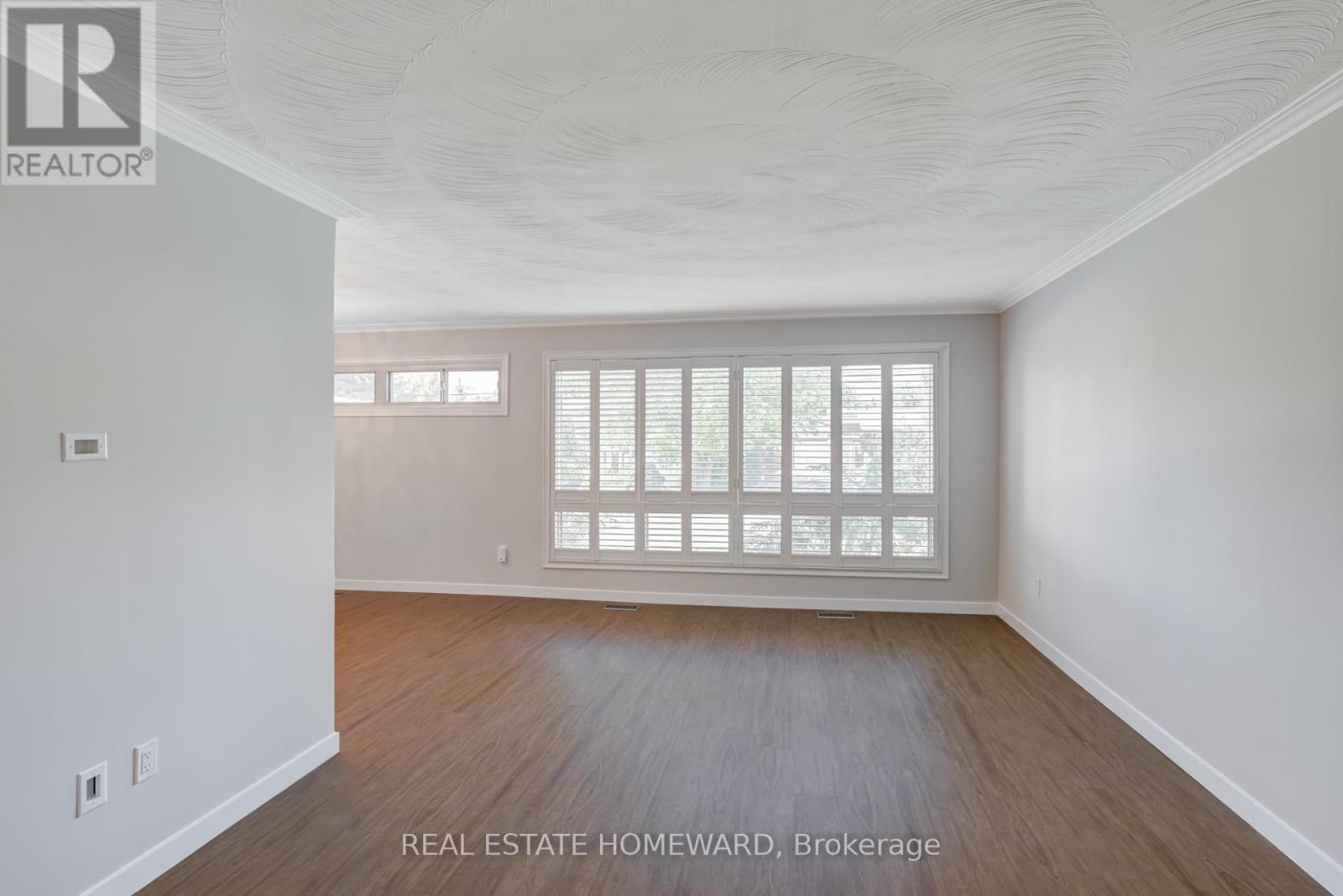 7 Jacinta Drive, Toronto, Ontario  M6L 1H6 - Photo 7 - W12437024