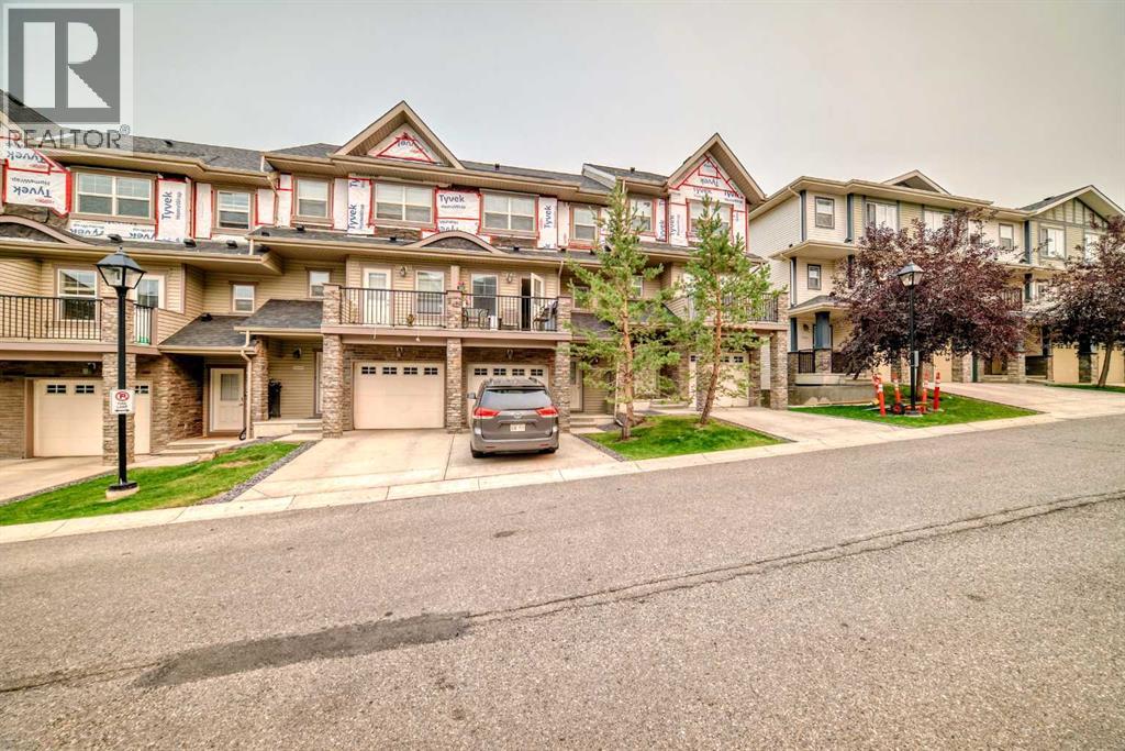119 Panatella Hill Nw, Calgary, Alberta  T3K 0S7 - Photo 2 - A2255744