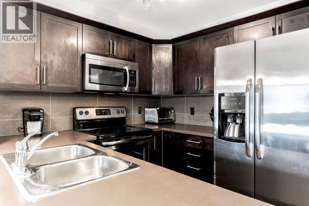 2319, 175 Panatella Hill, Calgary, Alberta  T3K 0V9 - Photo 1 - A2260197