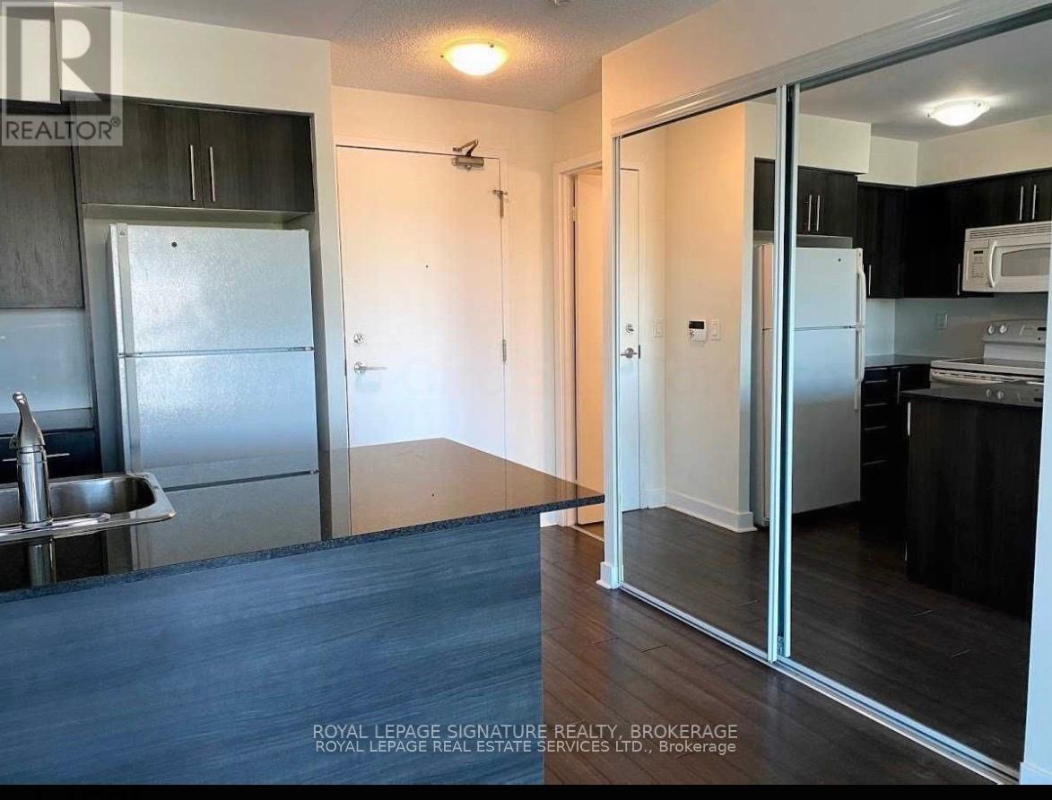 527 - 120 Dallimore Circle, Toronto, Ontario  M3C 4J1 - Photo 2 - C12437152