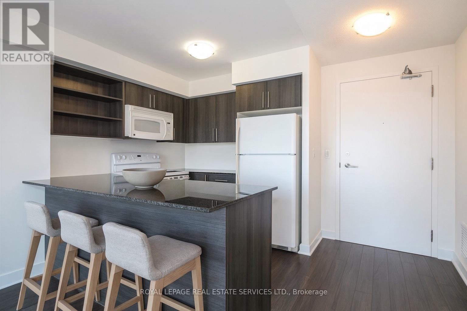 527 - 120 Dallimore Circle, Toronto, Ontario  M3C 4J1 - Photo 4 - C12437152