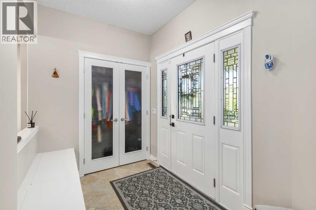 12481 Crestmont Boulevard Sw, Calgary, Alberta  T3B 5Z8 - Photo 2 - A2249604