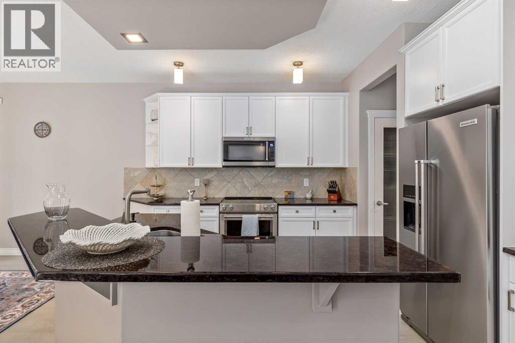 12481 Crestmont Boulevard Sw, Calgary, Alberta  T3B 5Z8 - Photo 5 - A2249604