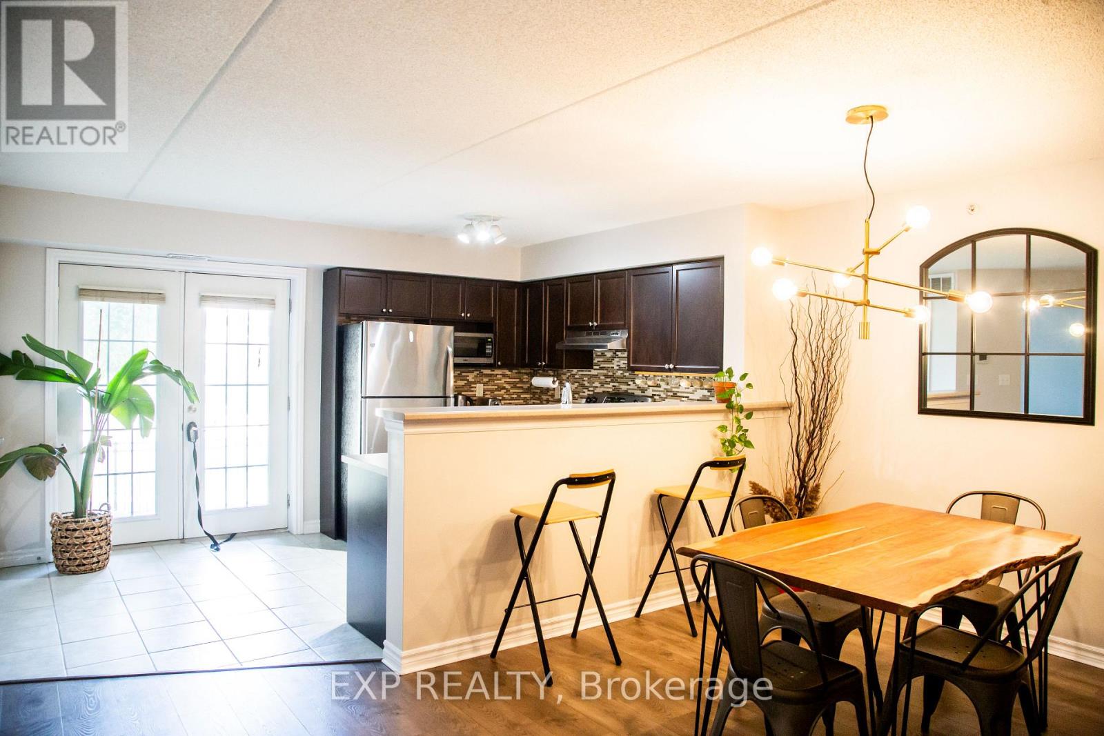 101 - 1380 Main Street E, Milton, Ontario  L9T 7S4 - Photo 2 - W12437385