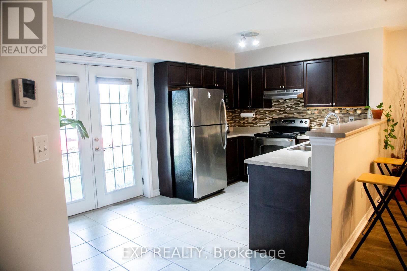 101 - 1380 Main Street E, Milton, Ontario  L9T 7S4 - Photo 4 - W12437385