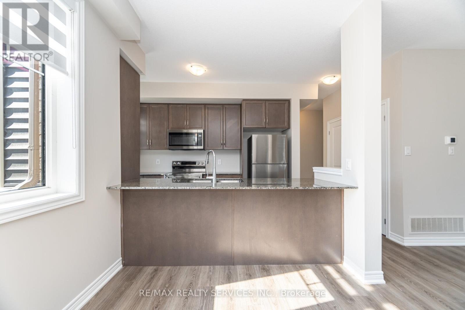 113 - 10 Birmingham Drive, Cambridge, Ontario  N1R 0C6 - Photo 2 - X12437148
