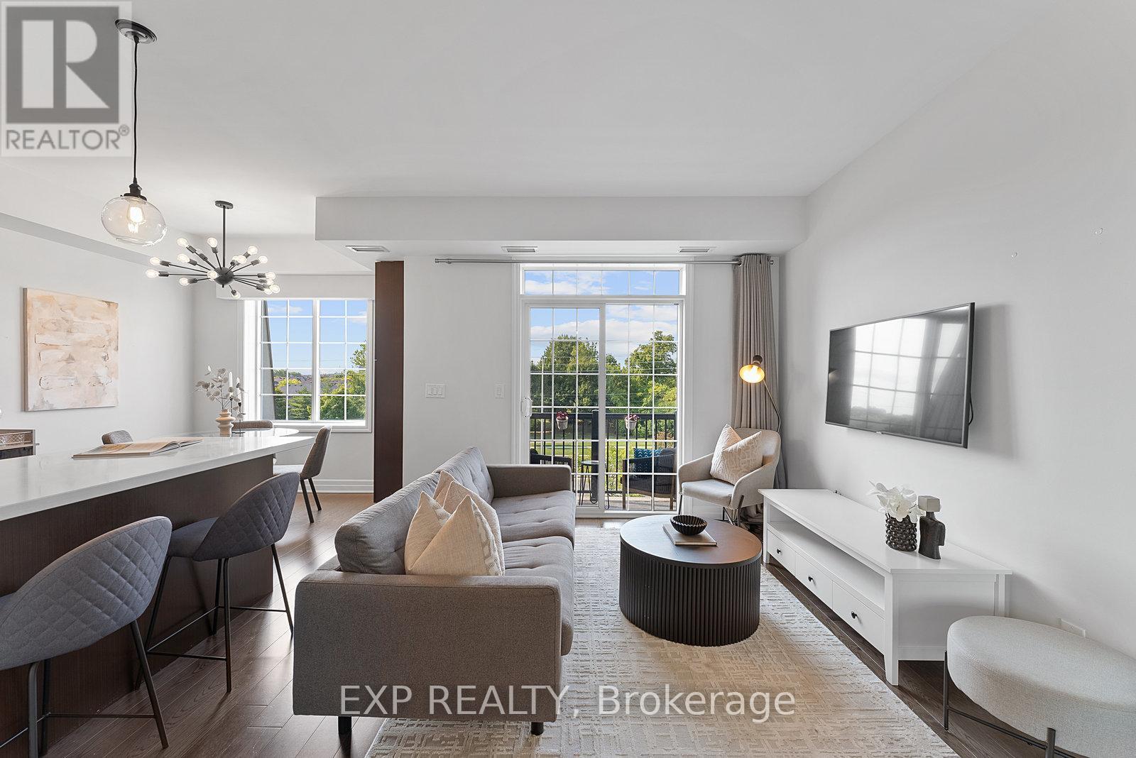 325 - 2300 Upper Middle Road W, Oakville, Ontario  L6M 0T4 - Photo 4 - W12437545