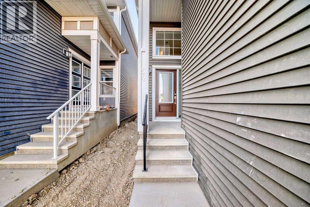 54 Homestead Common Ne, Calgary, Alberta  T3J 4J5 - Photo 5 - A2255436